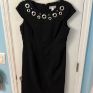 Dress barn black dress with silver circle design at top